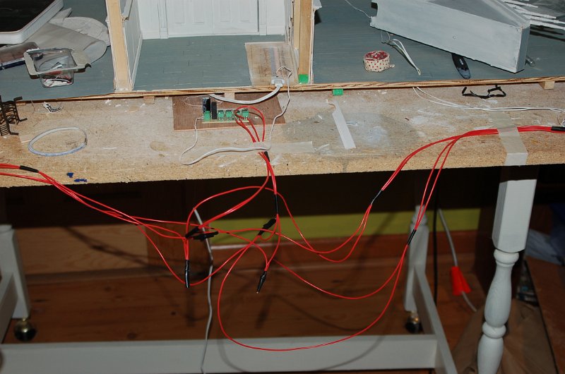 DSC_0111.JPG - I have run many of the 32 gauge wires into 20 gauge wires. I have run those wires into the circuit board. It looks like a bit of a mess because you don't want every fixture on the same circuit because they would all flicker at the same rate so you have to mix them up a bit.