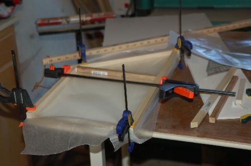 Sept03.JPG - We drew out the walls on foamcore and then attached the timbers to the foamcore.