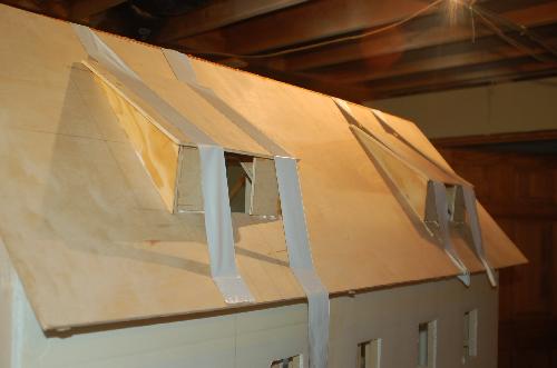 Sept04.JPG - We got both of the windows glued to the roof.
