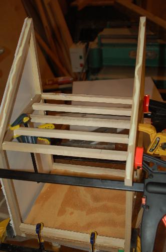 Sept06.JPG - Another view of the rafter gluing process.