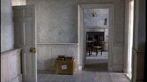 DVD_VIDEO-1.jpg - The entry showing the door to the stairs and the dining room.